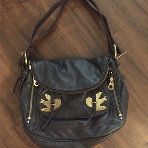 Marc Jacobs “petal to the metal” Natasha bag.
